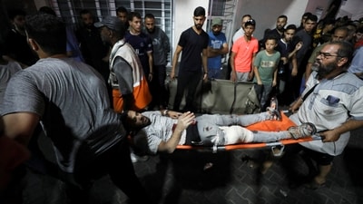 An injured person is assisted at Shifa Hospital after an Israeli air strike hit the nearby Al-Ahli Hospital, according to Gaza Health Ministry in Gaza City, Gaza Strip, October 17, 2023. REUTERS/Mohammed Al-Masri (REUTERS)