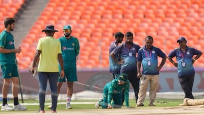 Pakistan's Mohammad Rizwan, centre, Iftikhar Ahmed and Shaheen Afridi check the pitch during a practice session (AP) Pakistan's Mohammad Rizwan, centre, Iftikhar Ahmed and Shaheen Afridi check the pitch during a practice session (AP)