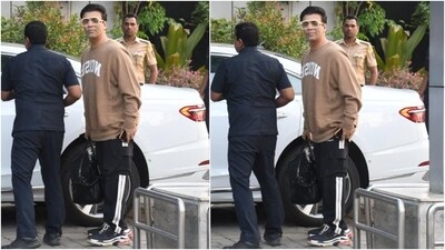 Karan Johar, on the other hand, chose a beige-coloured jumper and black jogger pants for the airport look. While the top featured a crew neckline, full-length sleeves, an oversized silhouette, and cinched hems, the bottoms have side pockets and a relaxed fitting. He completed the look with sneakers, nerdy glasses and backswept hairdo. (Instagram) Karan Johar, on the other hand, chose a beige-coloured jumper and black jogger pants for the airport look. While the top featured a crew neckline, full-length sleeves, an oversized silhouette, and cinched hems, the bottoms have side pockets and a relaxed fitting. He completed the look with sneakers, nerdy glasses and backswept hairdo. (Instagram)