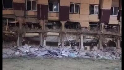 The hotel belonging to the gangster-turned-politician being demolished on the intervening night of Monday and Tuesday. (Photo from X)