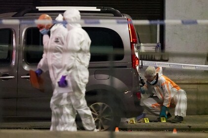 People work at a shooting scene as Belgian police secure the area, in Brussels, Belgium, October 16, 2023. REUTERS/Johanna Geron (REUTERS)
