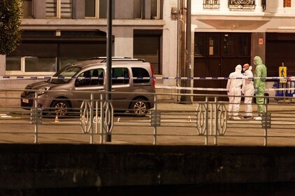 Police and inspectors work in an area where a shooting took place in the center of Brussels, Monday, Oct. 16, 2023. Belgian police say that two people are dead in central Brussels after several shots were fired. (AP Photo/Nicolas Landemard) (AP) Police and inspectors work in an area where a shooting took place in the center of Brussels, Monday, Oct. 16, 2023. Belgian police say that two people are dead in central Brussels after several shots were fired. (AP Photo/Nicolas Landemard) (AP)