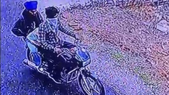 A CCTV grab of the two assailants released by Jalandhar police after a woman and her daughter were shot dead at their house at Bhujewal village on Tuesday. (HT Photo)
