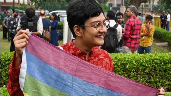 Members of LGBTQ+ community outside the Supreme Court on Tuesday. (Sanchit Khanna/HT photo)