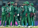 Bangladesh's captain Shakib Al Hasan (C) celebrates with teammates after taking the wicket of New Zealand's Devon Conway during the 2023 ICC Men's Cricket World Cup Bangladesh's captain Shakib Al Hasan (C) celebrates with teammates after taking the wicket of New Zealand's Devon Conway during the 2023 ICC Men's Cricket World Cup