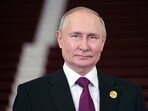 Russian president Vladimir Putin looks on. Russian president Vladimir Putin looks on.
