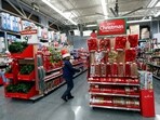 An employee checks on a Christmas display at a Walmart store in Chicago, Illinois, U.S. November 23, 2016.