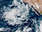 This satellite image shows Tropical Storm Norma forming near the Mexican Western Pacific coast. This satellite image shows Tropical Storm Norma forming near the Mexican Western Pacific coast.