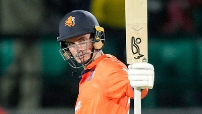 Netherlands skipper Scott Edwards raises his bat as he celebrates his half-century during their match against South Africa (ANI ) Netherlands skipper Scott Edwards raises his bat as he celebrates his half-century during their match against South Africa (ANI )