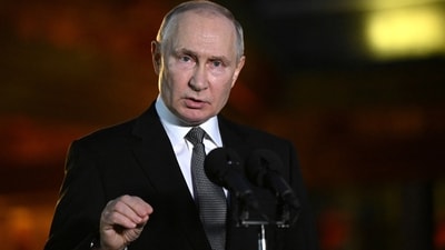 Russian president Vladimir Putin speaks during a press conference, (Reuters)
