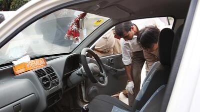 Forensic experts examine the car of 25-year-old television journalist Soumya Vishwanathan, who was driving back home on September 30, 2008 in her car when she was shot dead on a desolate stretch on Nelson Mandela Marg near Vasant Kunj around 3.30am. (HT Archive) Forensic experts examine the car of 25-year-old television journalist Soumya Vishwanathan, who was driving back home on September 30, 2008 in her car when she was shot dead on a desolate stretch on Nelson Mandela Marg near Vasant Kunj around 3.30am. (HT Archive)