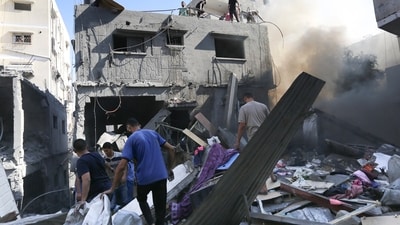 Israel-Hamas War: Palestinians look for survivors after Israeli airstrikes in Gaza City, Gaza Strip. (AP)