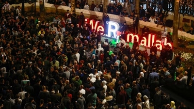 Palestinians rally in the West Bank city of Ramallah. A hospital in Gaza came under attack killing around 500 people. (AFP)