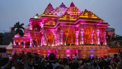 Organized by the Santosh Mitra Square Puja Committee, this unique pandal is modelled after the Ram Temple in Ayodhya. (PTI) Organized by the Santosh Mitra Square Puja Committee, this unique pandal is modelled after the Ram Temple in Ayodhya. (PTI)