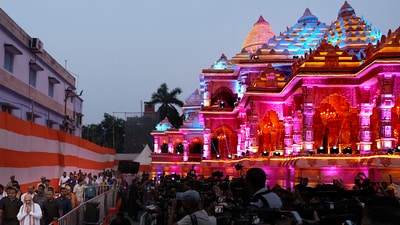  An illuminated community Durga Puja pandal, designed on the theme of Ram Mandir in Ayodhya, after its inauguration by Union Home Minister Amit Shah. (PTI) An illuminated community Durga Puja pandal, designed on the theme of Ram Mandir in Ayodhya, after its inauguration by Union Home Minister Amit Shah. (PTI)