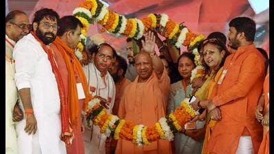 Uttar Pradesh Chief Minister Yogi Adityanath being garlanded during the BJP's Western Uttar Pradesh Dalit Conference, in Hapur, Tuesday. (PTI) Uttar Pradesh Chief Minister Yogi Adityanath being garlanded during the BJP's Western Uttar Pradesh Dalit Conference, in Hapur, Tuesday. (PTI)