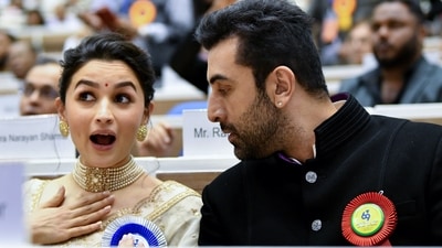 Alia Bhatt in a candid mood during the National Film Awards. She wore her wedding saree for the ceremony. Talking about it on Instagram, she said, "A special day calls for a special outfit. And sometimes....that outfit is already right there. What's special once can be special again. And again." (Rahul Singh) Alia Bhatt in a candid mood during the National Film Awards. She wore her wedding saree for the ceremony. Talking about it on Instagram, she said, "A special day calls for a special outfit. And sometimes....that outfit is already right there. What's special once can be special again. And again." (Rahul Singh)