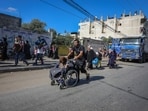 Palestinians flee on foot from Gaza City to southern Gaza after being told to leave their homes in the north by the Israeli military in the Gaza Strip on October 13. Palestinians flee on foot from Gaza City to southern Gaza after being told to leave their homes in the north by the Israeli military in the Gaza Strip on October 13.