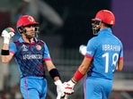 Afghanistan's Rahmanullah Gurbaz and Ibrahim Zadran during the ICC Men's Cricket World Cup 2023 match between New Zealand and Afghanistan