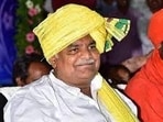 The video shows the minister sitting in the midst of a pool of currency notes.