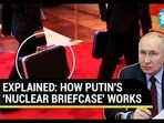 Putin spotted with 'nuclear briefcase' in China
