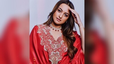 Sonakshi styled her look with an elegant diamond necklace with red emeralds, a pair of matching statement earrings and transparent heels to complete her glam look. (Instagram/@aslisona) Sonakshi styled her look with an elegant diamond necklace with red emeralds, a pair of matching statement earrings and transparent heels to complete her glam look. (Instagram/@aslisona)