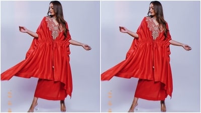 Her outfit featured a V-neckline adorned with intricate silver embroidery and sequin detailing, a flowing silhouette, a tie-up pattern at the midriff and an uneven hemline. She paired with a straight fitted skirt. (Instagram/@aslisona) Her outfit featured a V-neckline adorned with intricate silver embroidery and sequin detailing, a flowing silhouette, a tie-up pattern at the midriff and an uneven hemline. She paired with a straight fitted skirt. (Instagram/@aslisona)