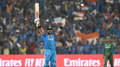 India's Virat Kohli raises his bat after hitting the winning runs and also completing his century during their match against Bangladesh (ANI ) India's Virat Kohli raises his bat after hitting the winning runs and also completing his century during their match against Bangladesh (ANI )