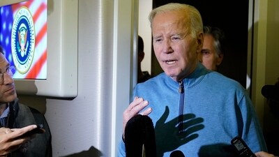 President Joe Biden talks to reporters aboard Air Force One during a refueling stop in at Ramstein Air Base in Germany, Wednesday, Oct. 18, 2023, as he travels back from Israel to Washington. (AP Photo/Evan Vucci) (AP) President Joe Biden talks to reporters aboard Air Force One during a refueling stop in at Ramstein Air Base in Germany, Wednesday, Oct. 18, 2023, as he travels back from Israel to Washington. (AP Photo/Evan Vucci) (AP)