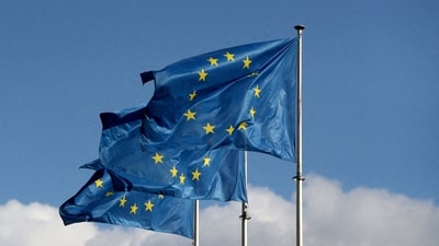 European Union flags fly outside the EU Commission headquarters in Brussels. (REUTERS)