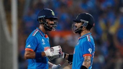 India's Virat Kohli celebrates reaching his century and winning the match with KL Rahul (REUTERS)