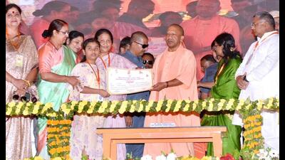 Chief minister Yogi Adityanath at the ‘Nari Shakti Vandan’ program organized at Seth Phool Chand Bangla PG College in Hathras on Thursday. (HT Photo)