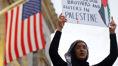 A demonstrator takes part in the "We Won’t Back Down: All Out for Palestine" protest in support of Palestinians, as the conflict between Israel and Hamas continues, in Boston, Massachusetts, U.S., October 16, 2023.   REUTERS/Brian Snyder (REUTERS)