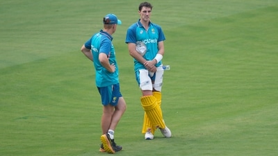 Australia's captain Pat Cummins talks to coach Andrew McDonald during a practice session. (AP) Australia's captain Pat Cummins talks to coach Andrew McDonald during a practice session. (AP)