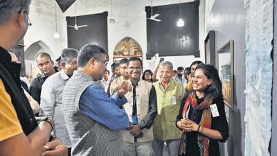 Mumbai, India - Oct. 19, 2023:Union Minister Dharmendra Pradhan interacts with students of Sir JJ School Of Arts during the art exhibition held at Sir JJ Schoolof Art, at CSMT, in Mumbai, India, on Thursday, October 19, 2023. (Photo by Anshuman Poyrekar/ Hindustan Times) (Hindustan Times)