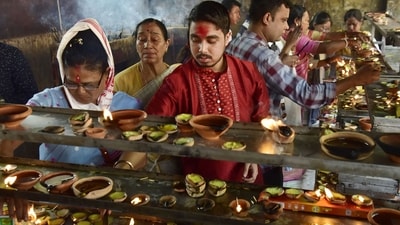 The Durga Puja festival, which spans over a fortnight, commenced at the Kamakhya temple with priests conducting rituals and reciting sacred slokas. (PTI)