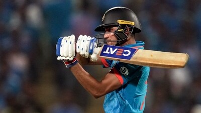 Shubman Gill, though, scored his first half century of the World Cup, eventually falling on 53 off 55. (PTI) Shubman Gill, though, scored his first half century of the World Cup, eventually falling on 53 off 55. (PTI)