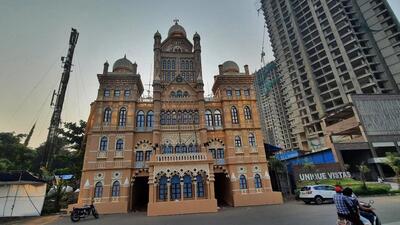 The New Bengal Club in Thane’s Manpada is known for its out of the box decorations during Durga Puja. This year's theme is 'Mumbai Meri Jaan' and they have made a replica of Mumbai's iconic BMC headquarters built by the British in 1893. It is a 95ft high replica and amongst the tallest attractions this year,in Thane, in Mumbai, India, on, Monday, October ,16, 2023. (Praful Gangurde / HT Photo) The New Bengal Club in Thane’s Manpada is known for its out of the box decorations during Durga Puja. This year's theme is 'Mumbai Meri Jaan' and they have made a replica of Mumbai's iconic BMC headquarters built by the British in 1893. It is a 95ft high replica and amongst the tallest attractions this year,in Thane, in Mumbai, India, on, Monday, October ,16, 2023. (Praful Gangurde / HT Photo)