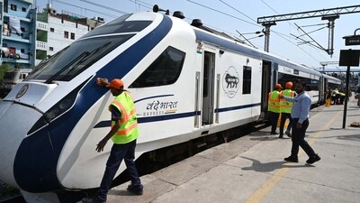 New Delhi, India - Oct. 1, 2023: Workers clean a Vande Bharat Express train at Hazrat Nizamuddin railway station, The Indian Railway introduced the '14 minutes of miracle� concept for speedy cleaning of trains from October 1, starting with 29 Vande Bharat trains at their respective destination stations across the country, in New Delhi, India, on Sunday, October 1, 2023. (Photo by Arvind Yadav/ Hindustan Times) (Hindustan Times) New Delhi, India - Oct. 1, 2023: Workers clean a Vande Bharat Express train at Hazrat Nizamuddin railway station, The Indian Railway introduced the '14 minutes of miracle� concept for speedy cleaning of trains from October 1, starting with 29 Vande Bharat trains at their respective destination stations across the country, in New Delhi, India, on Sunday, October 1, 2023. (Photo by Arvind Yadav/ Hindustan Times) (Hindustan Times)