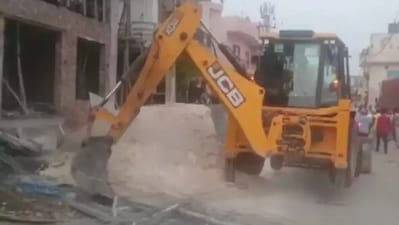 JCBs and other equipment were deployed for the demolitions. (ANI) JCBs and other equipment were deployed for the demolitions. (ANI)