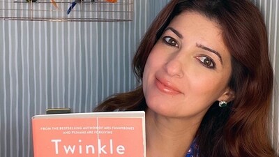 Twinkle Khanna with her new book Welcome to Paradise. Twinkle Khanna with her new book Welcome to Paradise.