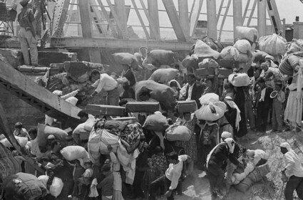 In this June 22, 1967 file photo, Palestinian refugees carry their belongings as they prepare to cross the wrecked Allenby Bridge over the Jordan River from the Israeli-occupied section of Jordan. (AP) In this June 22, 1967 file photo, Palestinian refugees carry their belongings as they prepare to cross the wrecked Allenby Bridge over the Jordan River from the Israeli-occupied section of Jordan. (AP)