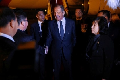 Russian Foreign Minister Sergei Lavrov takes part in a welcoming ceremony upon his arrival in Pyongyang. (Reuters)