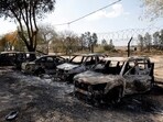 Burnt cars are seen in Kibbutz Nir Oz following a deadly infiltration by Hamas gunmen from the Gaza Strip on October 19.