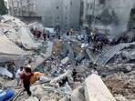 Palestinians search the destroyed annex of the Greek Orthodox Saint Porphyrius Church, the oldest church still in use in Gaza, damaged in a strike on Gaza. (AFP) Palestinians search the destroyed annex of the Greek Orthodox Saint Porphyrius Church, the oldest church still in use in Gaza, damaged in a strike on Gaza. (AFP)