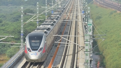 A RapidX train seen during a trial run on the Delhi Meerut RRTS Corridor at Vasundhra, in Ghaziabad. (PTI)