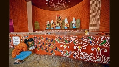 A Durga Puja Pandal made in the shape of new Parliament Building at CR Park in New Delhi. (Sanchit Khanna/HT) A Durga Puja Pandal made in the shape of new Parliament Building at CR Park in New Delhi. (Sanchit Khanna/HT)