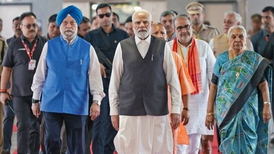 PM Modi arrives at Sahibabad RapidX Station in Ghaziabad on Friday. Union Minister for Petroleum and Natural Gas Hardeep Singh Puri, Uttar Pradesh Governor Anandiben Patel and State Chief Minister Yogi Adityanath were also present.&nbsp; (ANI/PIB)