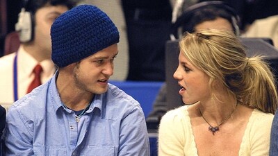 Britney Spears with then-boyfriend Justin Timberlake during an NBA match in 2002. Britney has said in her new memoir that she had an abortion during her relationship with Justin over two decades ago. (File Photo/ AFP) Britney Spears with then-boyfriend Justin Timberlake during an NBA match in 2002. Britney has said in her new memoir that she had an abortion during her relationship with Justin over two decades ago. (File Photo/ AFP)