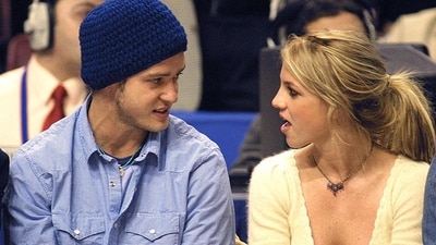 Britney Spears with then-boyfriend Justin Timberlake during an NBA match in 2002. Britney has said in her new memoir that she had an abortion during her relationship with Justin over two decades ago. (File Photo/ AFP) Britney Spears with then-boyfriend Justin Timberlake during an NBA match in 2002. Britney has said in her new memoir that she had an abortion during her relationship with Justin over two decades ago. (File Photo/ AFP)